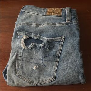 Distressed Blue Jeans